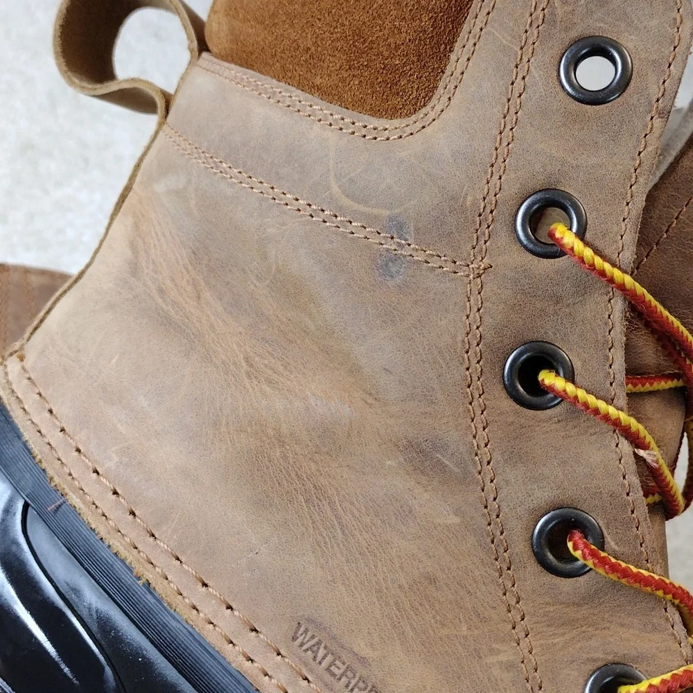 Sorel men's black rubber & tan leather winter boots. Size 11.5
